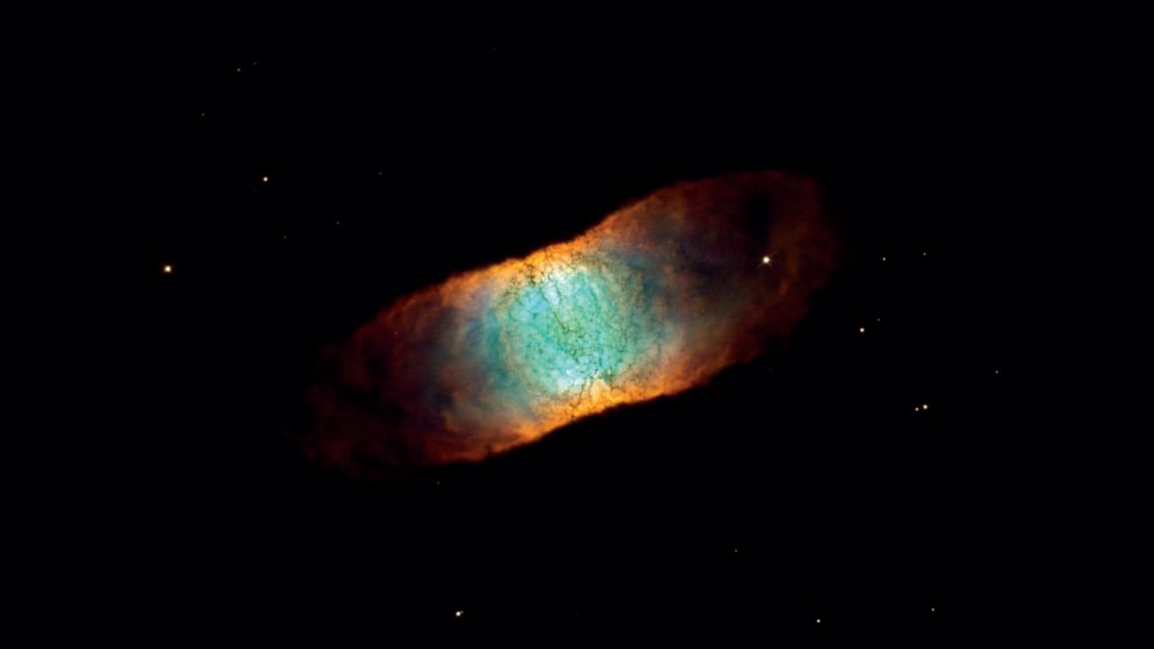 The Hubble telescope revealed a rainbow of colours in the dying star, IC 4406. Like many other planetary nebulae, IC 4406 shows a high degree of symmetry. The nebula's left and right halves are nearly mirror images of each other. Image credit: ESA/Hubble The Hubble telescope revealed a rainbow of colours in the dying star, IC 4406. Like many other planetary nebulae, IC 4406 shows a high degree of symmetry. The nebula's left and right halves are nearly mirror images of each other. Image credit: ESA/Hubble