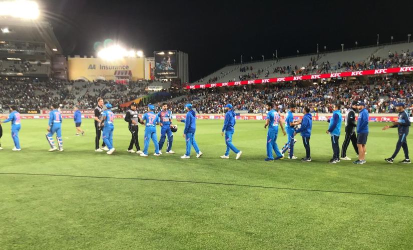 India and New Zealand cricketers shake hands after the first T20I of the five-match series. Image credits @BLACKCAPS India and New Zealand cricketers shake hands after the first T20I of the five-match series. Image credits @BLACKCAPS