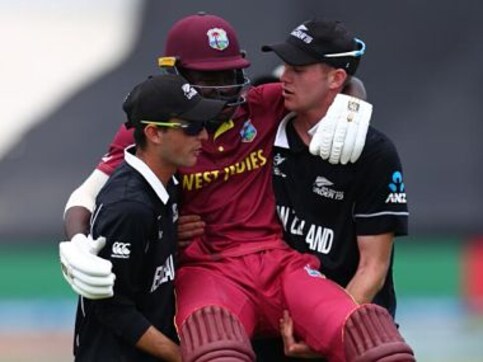 Watch: In heartwarming gesture, New Zealand players carry injured West Indies batsman off field during U-19 World Cup Watch: In heartwarming gesture, New Zealand players carry injured West Indies batsman off field during U-19 World Cup