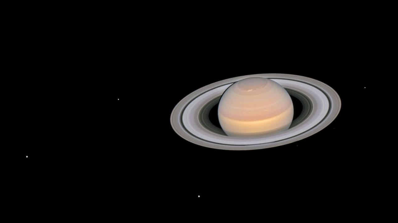  NASAs Hubble telescope captures Saturn changing its colours according to the seasons