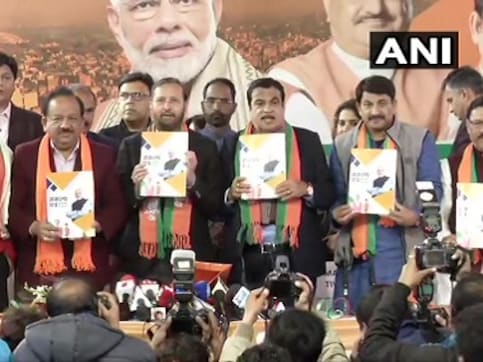 Delhi polls: BJP promises wheat flour at Rs 2 per kg and clean drinking water in manifesto; AAP calls document 'barbadi patra' Delhi polls: BJP promises wheat flour at Rs 2 per kg and clean drinking water in manifesto; AAP calls document 'barbadi patra'