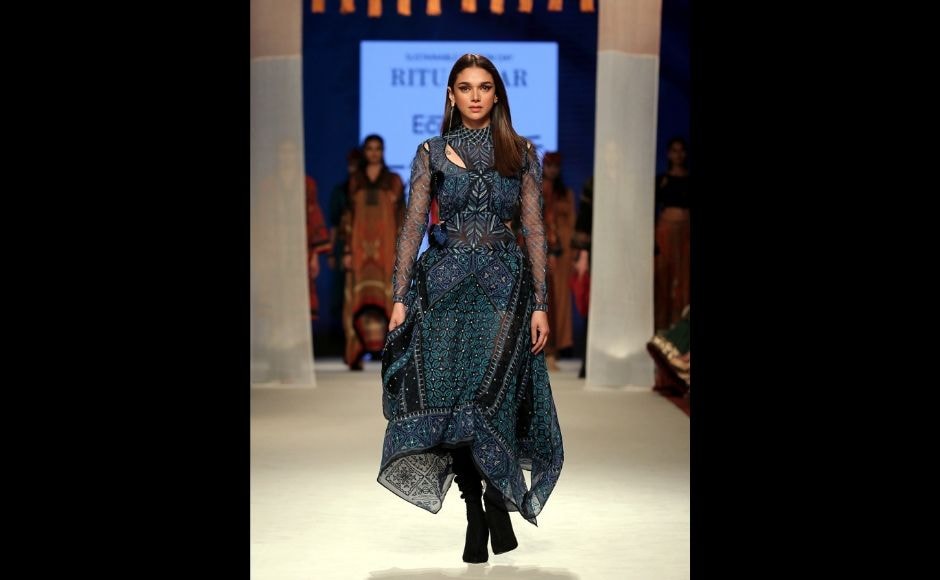 Actor Aditi Rao Hyadri walked the ramp for the Padma Shri awardee, Ritu Kumar at her environmentally friendly collection, Nature's Origami. Hyadri sported a hand embroidered silk organza asymmetric hem black and indigo dress.