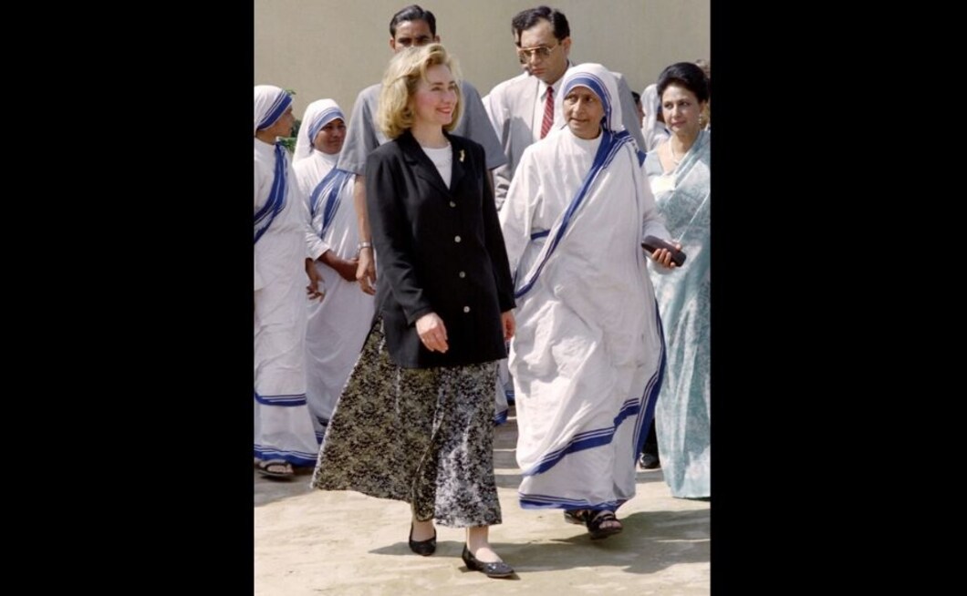 Former US First Lady Hillary Clinton with nuns at an orphanage run by Mother Teresa in New Dehli. Clinton was on the second leg of a 12-day south Asia tour in March 1995 and had announced that she would be donating around 20 beds to the home. Photo via Agence France-Presse. Former US First Lady Hillary Clinton with nuns at an orphanage run by Mother Teresa in New Dehli. Clinton was on the second leg of a 12-day south Asia tour in March 1995 and had announced that she would be donating around 20 beds to the home. Photo via Agence France-Presse.