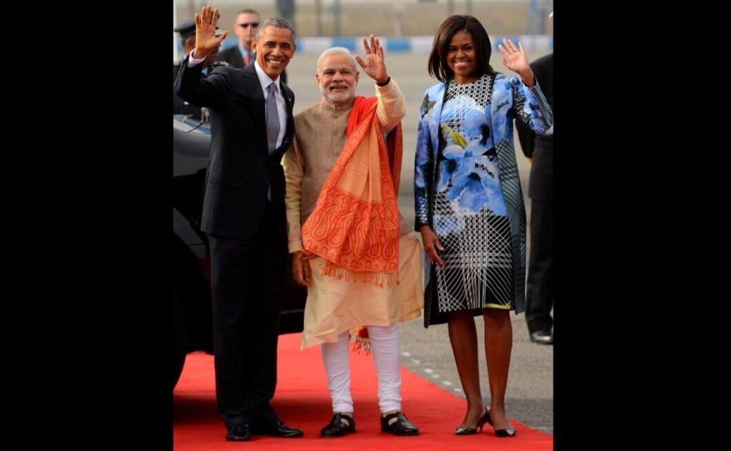 Prime Minister Narendra Modi with former US President Barack Obama and former First Lady Michelle Obama at the New Delhi Palam Air Force Station on 25 January, 2015. Photo via Getty Images. Prime Minister Narendra Modi with former US President Barack Obama and former First Lady Michelle Obama at the New Delhi Palam Air Force Station on 25 January, 2015. Photo via Getty Images.