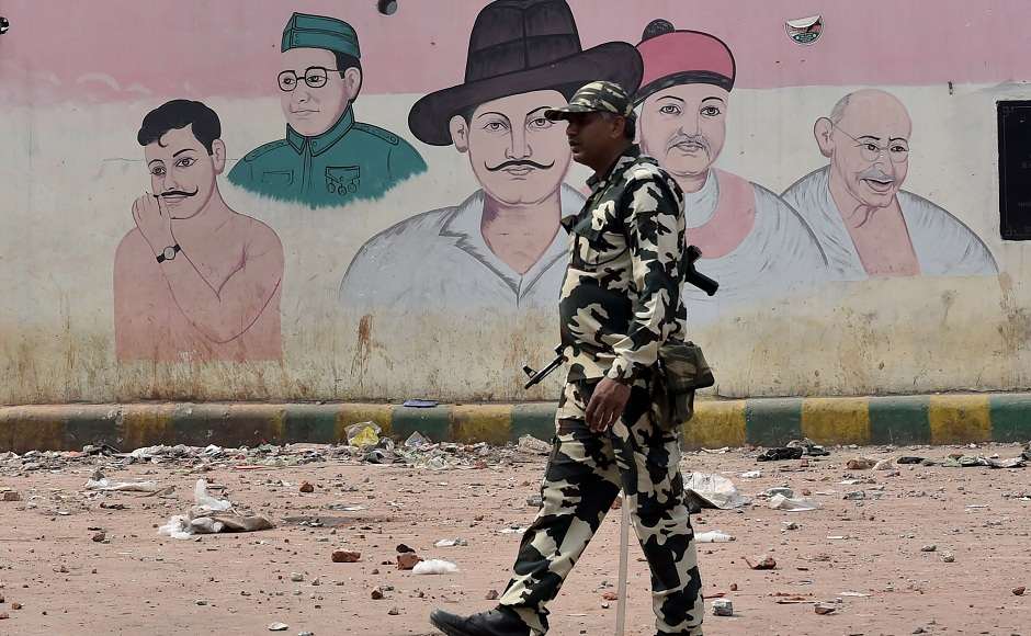 A brittle quiet seemed to have settled over parts of northeast Delhi on Wednesday with bouts of violence in some parts. Police and paramilitary personnel in large numbers descended on the roads of the riot-hit areas, keeping mobs away. The Delhi Police said they had registered 18 FIRs and arrested 106 people for their alleged involvement in the violence which claimed 27 lives. PTI A brittle quiet seemed to have settled over parts of northeast Delhi on Wednesday with bouts of violence in some parts. Police and paramilitary personnel in large numbers descended on the roads of the riot-hit areas, keeping mobs away. The Delhi Police said they had registered 18 FIRs and arrested 106 people for their alleged involvement in the violence which claimed 27 lives. PTI