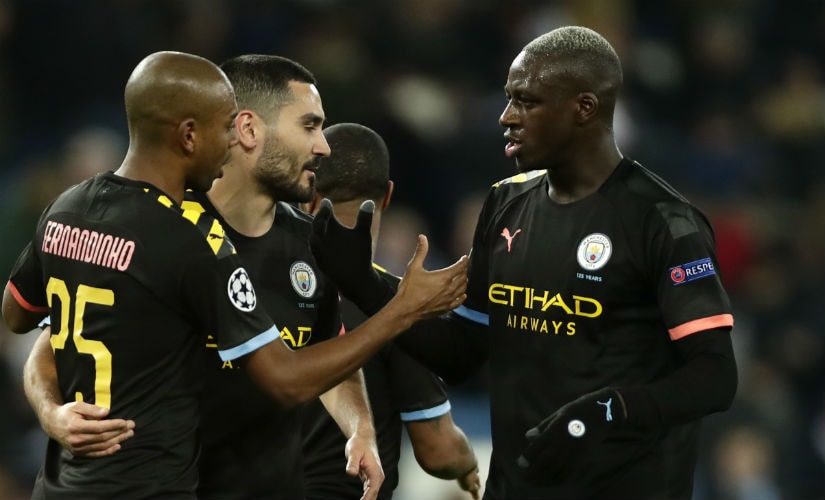 Manchester City's players celebrate their win. AP