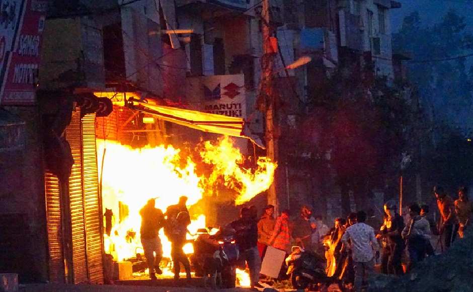 The arson and stone pelting continued over night, leading to a communal riot like situation on Tuesday. Several localities like Chand Bagh, Bhajanpura, Gokulpuri, Maujpur, Kardampuri and Jaffrabad saw pitched battles between the members of two groups who also hurled petrol bombs and opened fire. Frenzied groups thrashed people on the road and vandalised vehicles, set ablaze shops and homes. PTI The arson and stone pelting continued over night, leading to a communal riot like situation on Tuesday. Several localities like Chand Bagh, Bhajanpura, Gokulpuri, Maujpur, Kardampuri and Jaffrabad saw pitched battles between the members of two groups who also hurled petrol bombs and opened fire. Frenzied groups thrashed people on the road and vandalised vehicles, set ablaze shops and homes. PTI