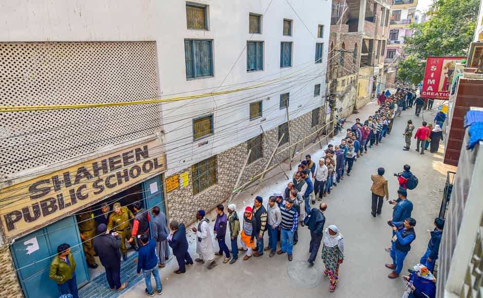 Voters stand in a queue at a polling booth in Shaheen Public School in Shaheen Bagh, Okhla. AAP's Amanatullah is the sitting MLA and also the candidate of the party for this election. Congress's Parvez Hashmi and BJP's Brahm Singh Bidhuri are the other contenders. The five polling stations in Shaheen Bagh, the epicentre of anti-CAA protests, were categorised as highly sensitive. PTI Voters stand in a queue at a polling booth in Shaheen Public School in Shaheen Bagh, Okhla. AAP's Amanatullah is the sitting MLA and also the candidate of the party for this election. Congress's Parvez Hashmi and BJP's Brahm Singh Bidhuri are the other contenders. The five polling stations in Shaheen Bagh, the epicentre of anti-CAA protests, were categorised as highly sensitive. PTI