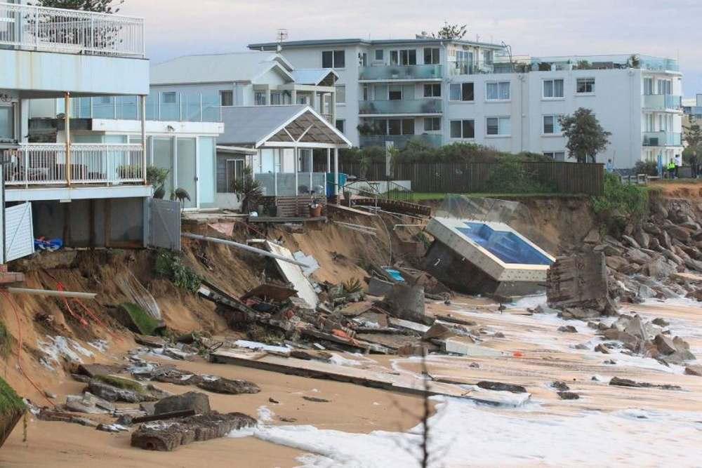 Storm damage in the northern beaches of Sydney in 2016. Sea-level rise is expected to affect the coastal fringe. Image credit: Australian Associated Press