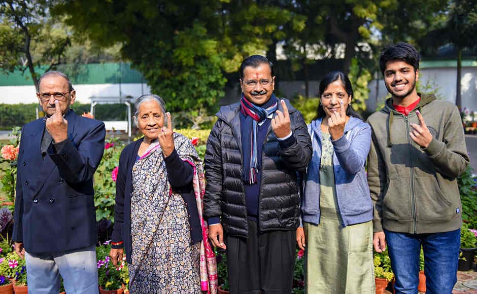 Delhi Chief Minister and AAP convenor Arvind Kejriwal and his family members show their finger marked with indelible ink after casting vote during the Delhi Assembly elections at a polling station, in Civil Lines area. Image courtesy: Twitter/@ArvindKejriwal Delhi Chief Minister and AAP convenor Arvind Kejriwal and his family members show their finger marked with indelible ink after casting vote during the Delhi Assembly elections at a polling station, in Civil Lines area. Image courtesy: Twitter/@ArvindKejriwal