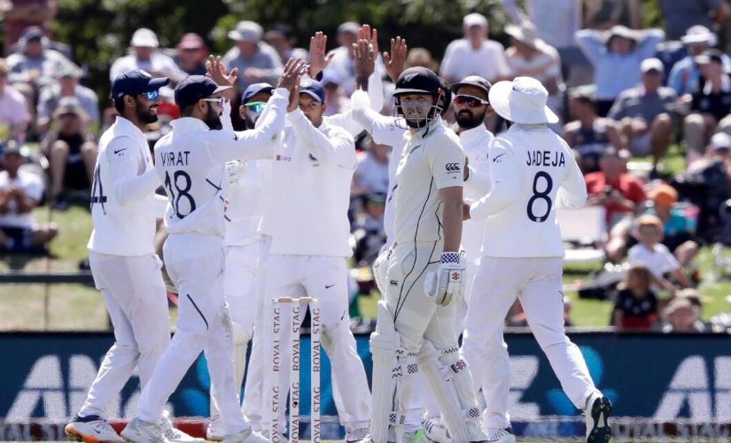 New Zealand's Henry Nicholls reacts as India's players celebrate his dismissal during play on day two of the second Test between New Zealand and India. AP New Zealand's Henry Nicholls reacts as India's players celebrate his dismissal during play on day two of the second Test between New Zealand and India. AP