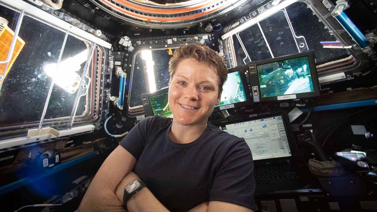 NASA astronaut Anne McClain poses in the cupola of the International Space Station while she works with the Canadarm2 robotics maneuvers. Image credit: NASA
