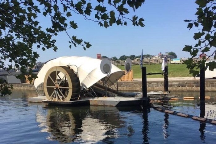 The Waterwheel Powered Trash Interceptor, also known as “Mr. Trash Wheel,” temporarily sported large googly eyes in 2015. Three such devices are now operating in Baltimore, Maryland. Image courtesy of Clearwater Mills LLC.