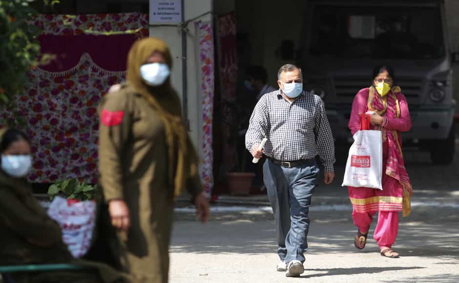 People wearing protective face masks in Jammu. Indian Council of Medical Research said that random sampling study for community transmission of coronavirus have tested negative, signifying the community spread of the disease has not taken place in the country so far. On Thursday Prime Minister Narendra Modi announced about ‘Janata Curfew’ which will be in place on 22 March from 7 am to 9 pm. AP People wearing protective face masks in Jammu. Indian Council of Medical Research said that random sampling study for community transmission of coronavirus have tested negative, signifying the community spread of the disease has not taken place in the country so far. On Thursday Prime Minister Narendra Modi announced about ‘Janata Curfew’ which will be in place on 22 March from 7 am to 9 pm. AP