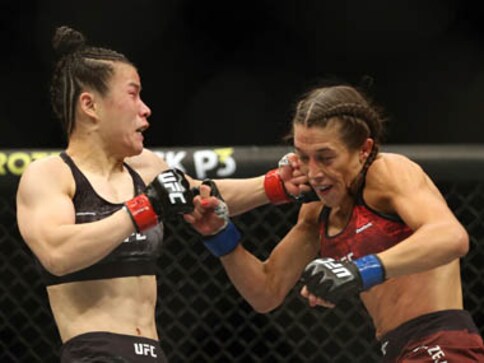 UFC 248: Zhang Weili retains strawweight belt in bruising battle against Joanna Jedrzedczyk; Israel Adesanya wins in snooze-fest UFC 248: Zhang Weili retains strawweight belt in bruising battle against Joanna Jedrzedczyk; Israel Adesanya wins in snooze-fest