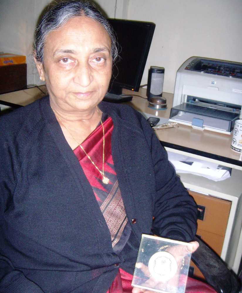Damayanti with the All-England medal given to her as a keepsake by 1966 champion Judy Devlin-Hashman. Image courtesy: Shirish Nadkarni