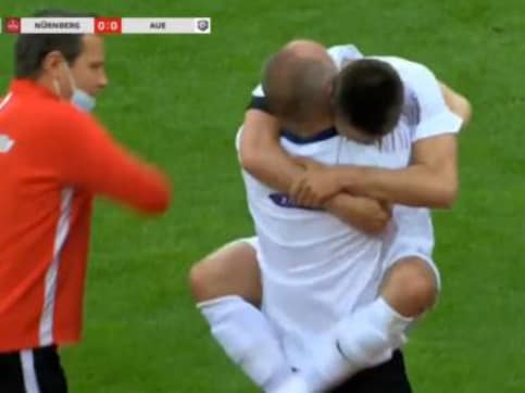 German second division player Dimitrij Nazarov breaks rules to celebrate goal with hug for driver that saved his life German second division player Dimitrij Nazarov breaks rules to celebrate goal with hug for driver that saved his life