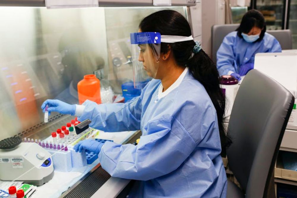 Research has shown pooled testing to be accurate for pools up to eight samples, but labs need to get certified to do pooled testing before this approach could be widely adopted. AP Photo/John Minchillo