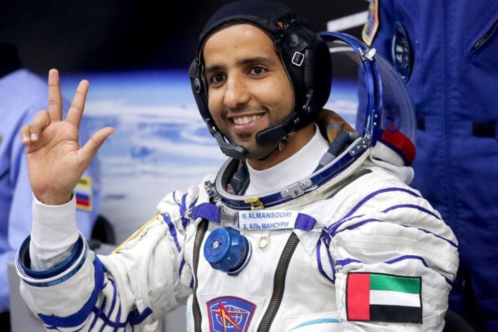 The United Arab Emirates’ first astronaut, Hazza Al Mansouri, gives an OK sign during a spacesuit check before a launch to the International Space Station. Sergei Savostyanov/TASS via Getty Images