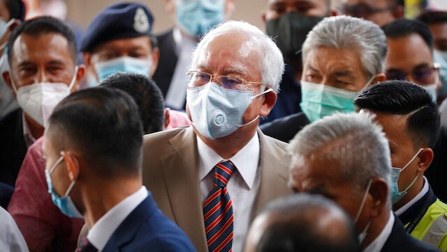 Malaysian ex-PM Najib Razak convicted of 7 graft charges over multi-billion-dollar 1MDB scam Malaysian ex-PM Najib Razak convicted of 7 graft charges over multi-billion-dollar 1MDB scam