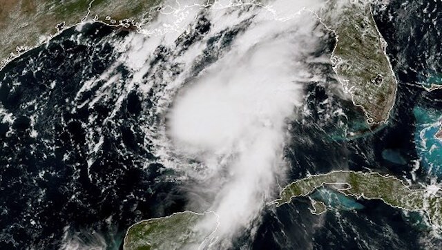 Storm Marco expected to make landfall in Louisiana today; 'Laura' kills 11 in Dominican Republic, Haiti Storm Marco expected to make landfall in Louisiana today; 'Laura' kills 11 in Dominican Republic, Haiti