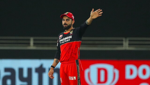 IPL 2020: RCB captain Virat Kohli accidentally applies saliva on ball during game against DC, immediately realises error IPL 2020: RCB captain Virat Kohli accidentally applies saliva on ball during game against DC, immediately realises error