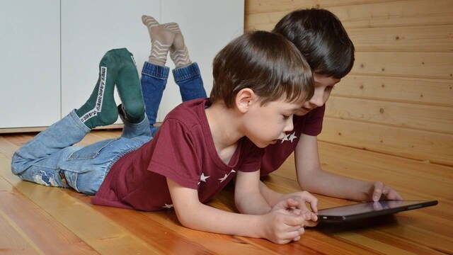 China revamps a law that now bans 'addictive' content online to protect kids China revamps a law that now bans 'addictive' content online to protect kids