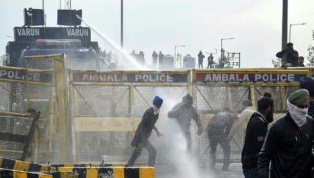 Indian police use water cannon to disperse farmers marching to New Delhi to protest against recent agricultural reforms. AFP Indian police use water cannon to disperse farmers marching to New Delhi to protest against recent agricultural reforms. AFP