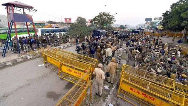 Hundreds of policemen were deployed at different entry points on Friday (Singhu and Burari entry points were closed on Saturday) to Delhi parking barricades, trucks full of sand and laying barbed wire to block the farmers' path on Friday as they pushed to enter the National Capital as part of the 'Delhi Chalo' march to protest against new farm laws. PTI Hundreds of policemen were deployed at different entry points on Friday (Singhu and Burari entry points were closed on Saturday) to Delhi parking barricades, trucks full of sand and laying barbed wire to block the farmers' path on Friday as they pushed to enter the National Capital as part of the 'Delhi Chalo' march to protest against new farm laws. PTI