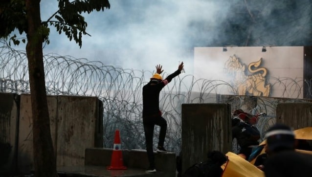 Thai police fires water cannon, tear gas at pro-democracy rally day before parliament votes on constitutional amendments Thai police fires water cannon, tear gas at pro-democracy rally day before parliament votes on constitutional amendments