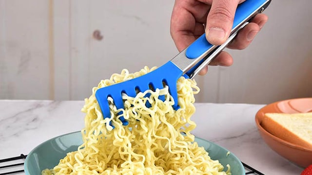 A pair of tongs to make cooking and serving easy A pair of tongs to make cooking and serving easy