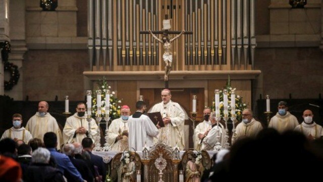 In this picture, the Latin Patriarch of Jerusalem Pierbattista Pizzaballa (C) leads Christmas morning mass at the Church of the Nativity, the site where Jesus Christ is believed to have been born, in the biblical city of Bethlehem in the occupied West Bank. AFP In this picture, the Latin Patriarch of Jerusalem Pierbattista Pizzaballa (C) leads Christmas morning mass at the Church of the Nativity, the site where Jesus Christ is believed to have been born, in the biblical city of Bethlehem in the occupied West Bank. AFP