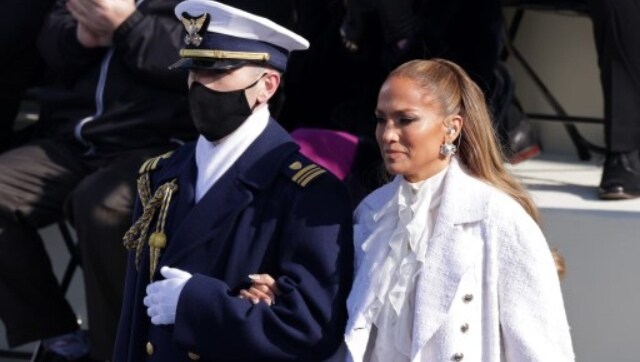 Following Gaga's performance of 'The Star-Spangled Banner' Jennifer Lopez took the stage, performing Woody Guthrie's classic 'This Land Is Your Land', a tune with socialist leanings the folk legend is said to have written in response to the more nationalistic 'God Bless America'. AFP Following Gaga's performance of 'The Star-Spangled Banner' Jennifer Lopez took the stage, performing Woody Guthrie's classic 'This Land Is Your Land', a tune with socialist leanings the folk legend is said to have written in response to the more nationalistic 'God Bless America'. AFP