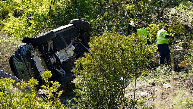 Tiger Woods 'awake, responsive, recovering' after surgery on both legs following serious roll-over car crash