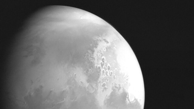China's Tianwen-1 Mars probe returns first photos showing canyons on the Red Planet surface China's Tianwen-1 Mars probe returns first photos showing canyons on the Red Planet surface