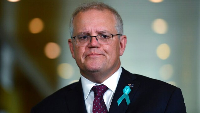 Australian PM Scott Morrison urges calm after Solomons leader cites 'invasion' threat Australian PM Scott Morrison urges calm after Solomons leader cites 'invasion' threat