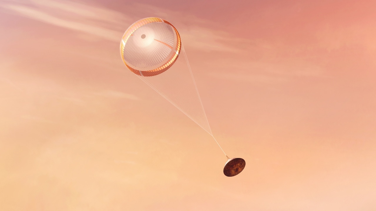The spacecraft descending after the parachute has been deployed.  Image credit: NASA/JPL-Caltech
