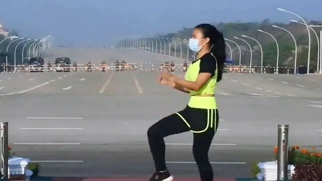 Watch: Aerobics instructor performs dance routine oblivious to Myanmar coup unfolding behind her