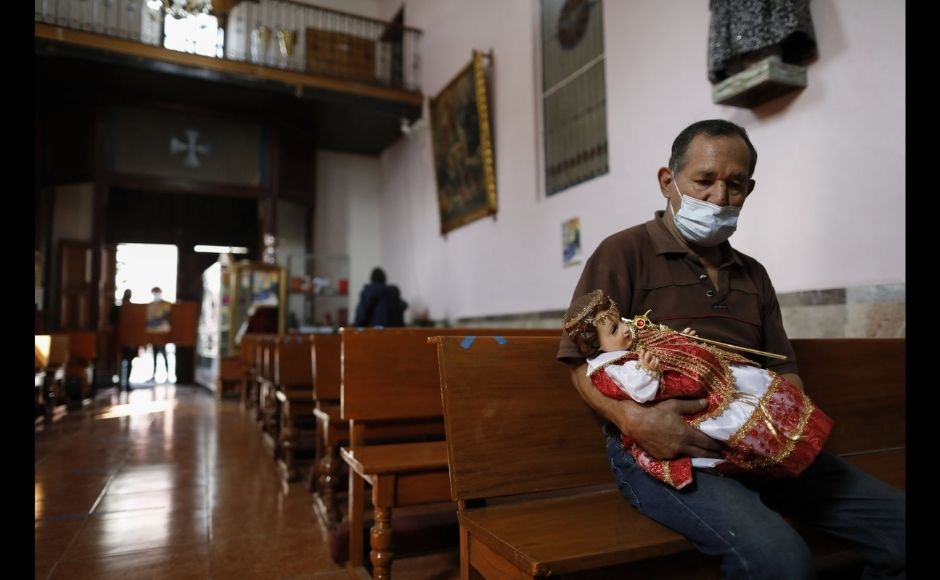 A man waits to have his Baby Jesus figure blessed with holy water at Purification of Our Lady of Candlemas Chapel in Mexico City, Tuesday, 2 February, 2021. Photo via The Associated Press/Rebecca Blackwell A man waits to have his Baby Jesus figure blessed with holy water at Purification of Our Lady of Candlemas Chapel in Mexico City, Tuesday, 2 February, 2021. Photo via The Associated Press/Rebecca Blackwell