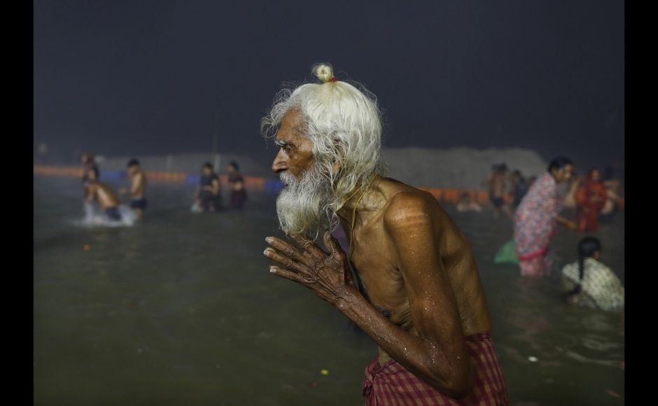 An elderly pilgrim prays after a holy dip at the Sangam in Prayagraj, India, Thursday, 11 February, 2021. Photo via The Associated Press/Rajesh Kumar Singh) An elderly pilgrim prays after a holy dip at the Sangam in Prayagraj, India, Thursday, 11 February, 2021. Photo via The Associated Press/Rajesh Kumar Singh)