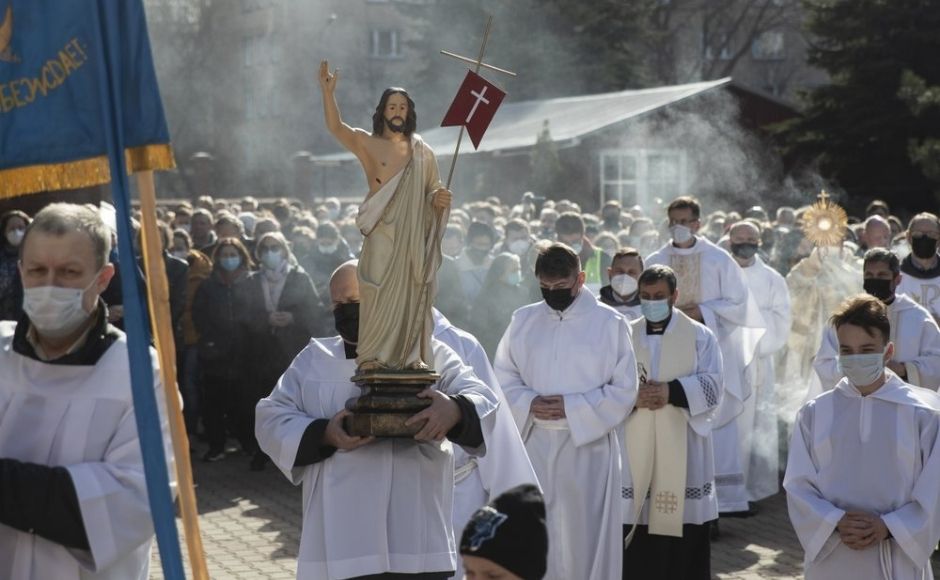 Catholic priest carries a statue of Jesus Christ as he walks in religious procession during the Holy Easter celebration in the Cathedral of the Immaculate Conception in Moscow, Russia. Photo via The Associated Press/Pavel Golovkin Catholic priest carries a statue of Jesus Christ as he walks in religious procession during the Holy Easter celebration in the Cathedral of the Immaculate Conception in Moscow, Russia. Photo via The Associated Press/Pavel Golovkin