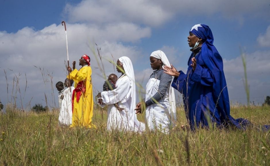 Apostolic Pentecostals celebrate Easter in field in the Johannesburg township of Soweto. Such South African independent church consist of small groups of worshippers mixing African traditions and bible study. Photo via The Associated Press/Jerome Delay Apostolic Pentecostals celebrate Easter in field in the Johannesburg township of Soweto. Such South African independent church consist of small groups of worshippers mixing African traditions and bible study. Photo via The Associated Press/Jerome Delay