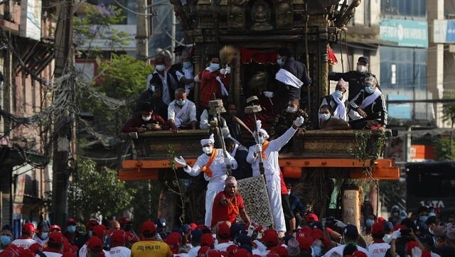 In Nepal, devotees mark 1000-year-old Hindu chariot festival amid COVID-19 surge