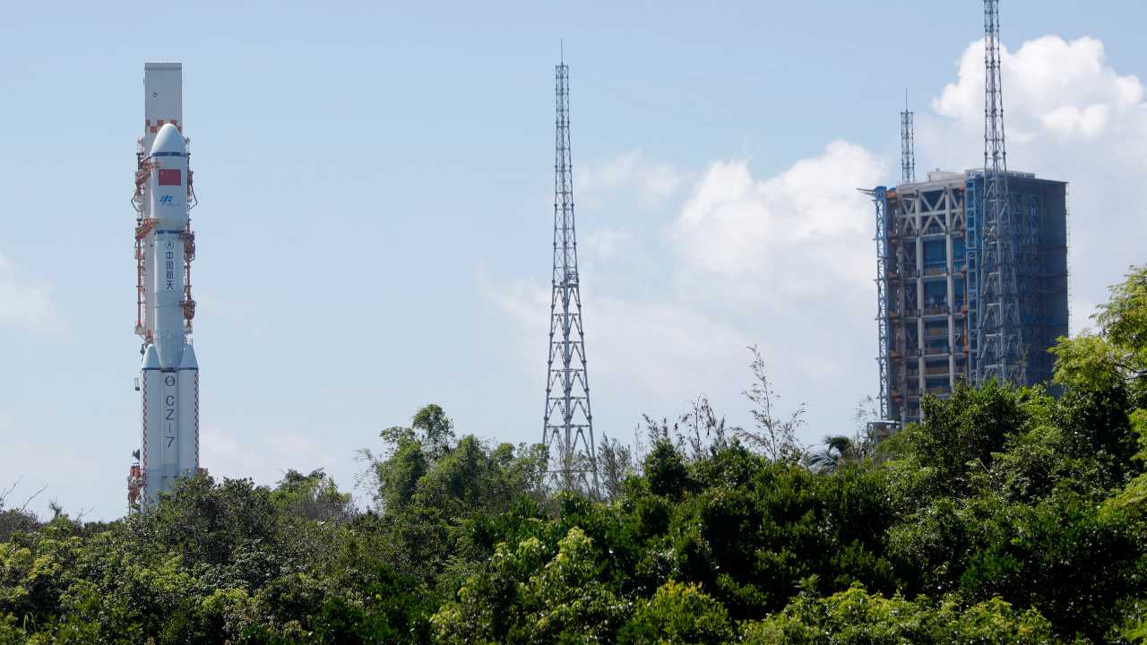 a Long March-7 carrying a Tianzhou-2 cargo spacecraft is moved to the launch area at the Wenchang Spacecraft Launch Site in southern China's Hainan Province on May 16, 2021. China postponed a supply mission to its new space station Thursday, May 20, 2021 for unspecified technical reasons. Image credit: Guo Wenbin/Xinhua via AP