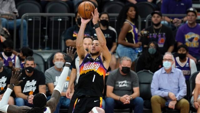 NBA: Devin Booker, Deandre Ayton lead Suns past Lakers in playoff debuts