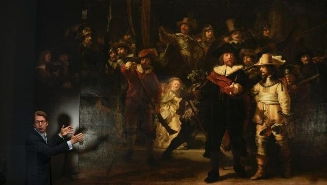 Artificial intelligence recreates Rembrandt's Night Watch that has stripped off parts, in Amsterdam’s Rijksmuseum Artificial intelligence recreates Rembrandt's Night Watch that has stripped off parts, in Amsterdam’s Rijksmuseum