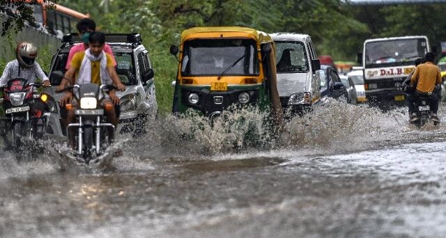 Traffic crawls, life disrupted in Mumbai and Delhi owing to heavy rains Traffic crawls, life disrupted in Mumbai and Delhi owing to heavy rains