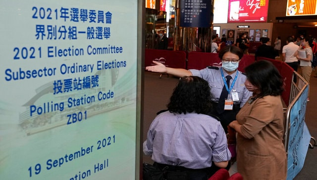 Select Hong Kong residents vote for new electors in first polls after passage of pro-Beijing laws