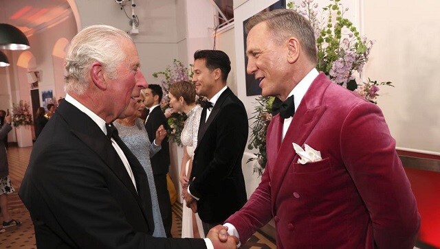 Britain's Prince Charles, left, meets some of the cast including actor Daniel Craig, right, at the world premiere of the new James Bond film "No Time To Die" at Royal Albert Hall in London, Tuesday, Sept. 28, 2021. (Chris Jackson/Pool Photo via AP) Britain's Prince Charles, left, meets some of the cast including actor Daniel Craig, right, at the world premiere of the new James Bond film "No Time To Die" at Royal Albert Hall in London, Tuesday, Sept. 28, 2021. (Chris Jackson/Pool Photo via AP)