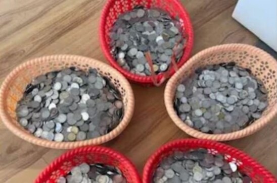 Assam man buys scooter with sack full of coins kept as savings; watch viral video here Assam man buys scooter with sack full of coins kept as savings; watch viral video here